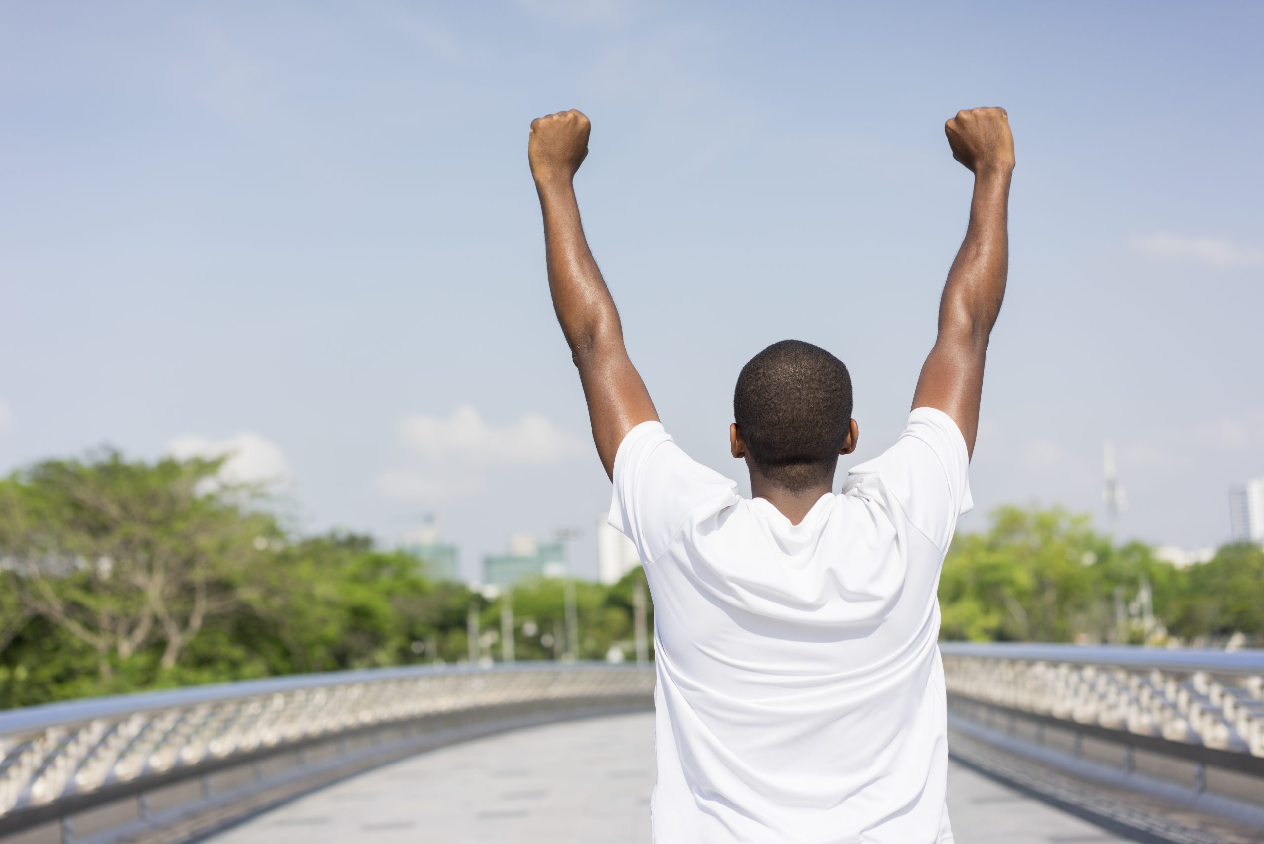 Back of black man enjoying city view